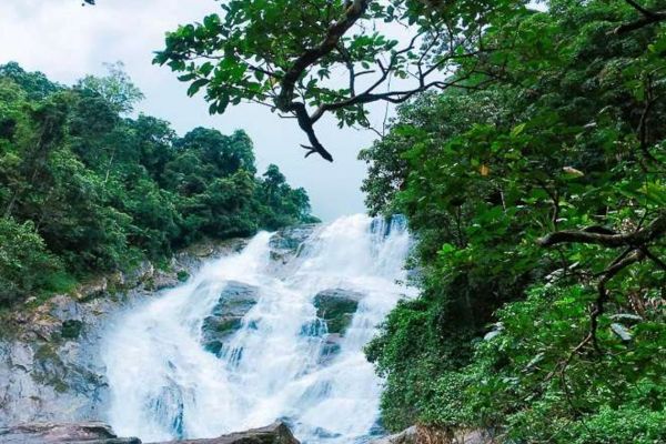 Luong Waterfall gently cascading like a silver ribbon through Ha Giang highlands